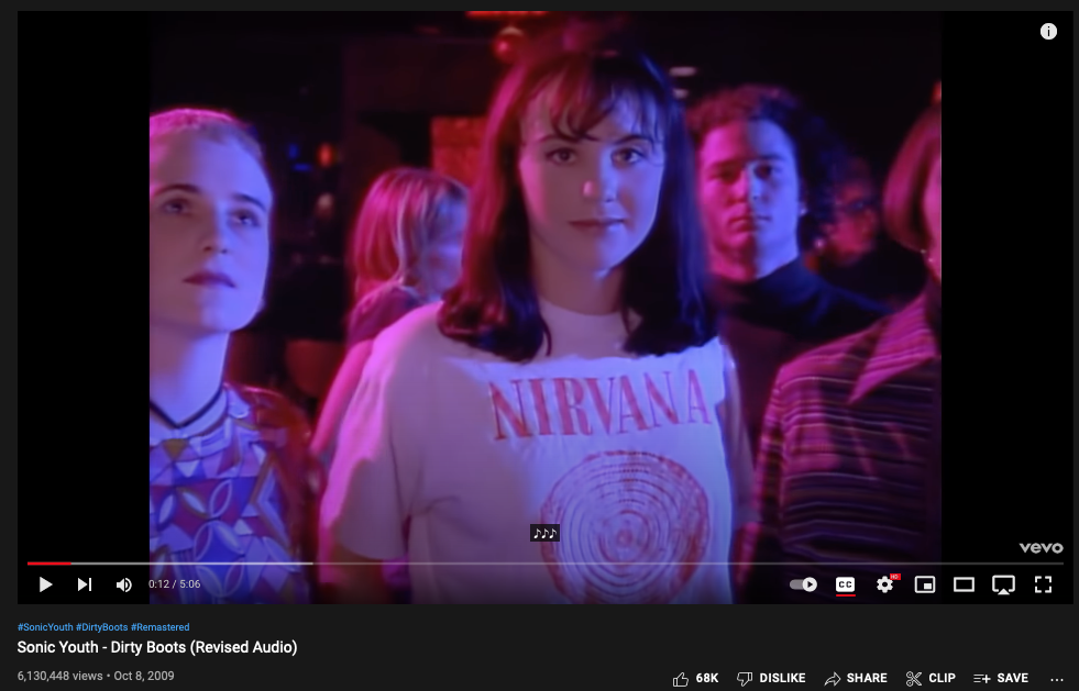still from 1991 Sonic Youth Dirty Boots video showing girl in Nirvana t-shirt
